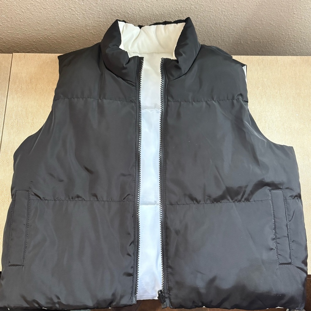 RSQ Women’s Reversible Puffer Vest from Tillys